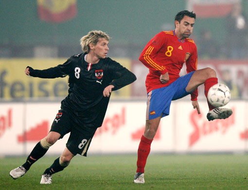 World Cup Gallery: Spain's Xavi Hernandez controls the ball