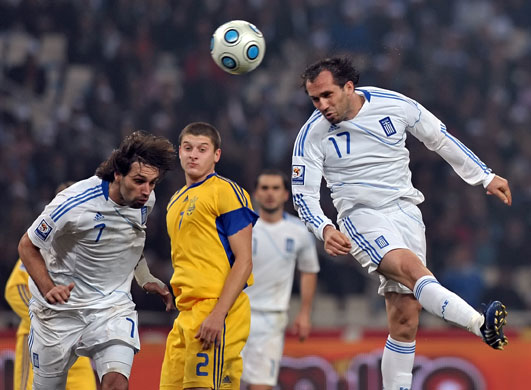 World Cup key players: Greece's Theofanis Gekas (R) tries to sc
