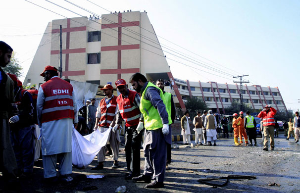Pakistan bombing: Volunteers collect body parts of the victims