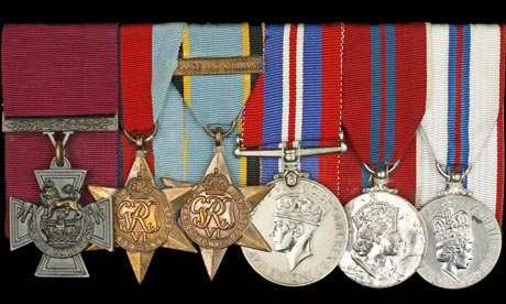 A Victoria Cross awarded to a second world war bomber pilot was today sold 