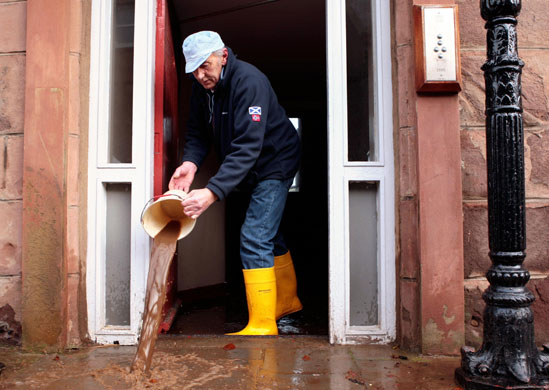 weather: Locals clear their houses on Stonehaven High Street in Aberdeenshire