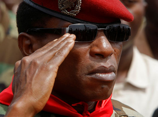 Guinea unrest: Guinea's military leader Captain Moussa Dadis Camara saluting