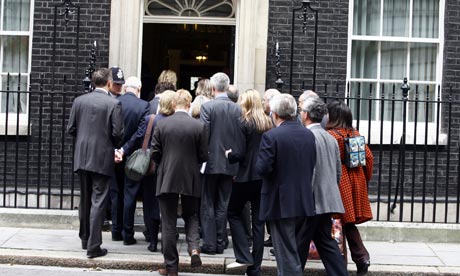 Journalists arrive for Gordon Brown's monthly press conference at 10 Downing Street in October 2007.