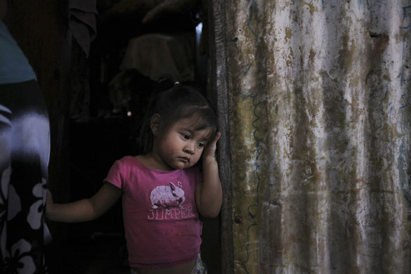 24 hours in pictures : Villa Canales, Guatemala:The child of a murdered bus driver