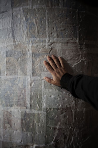 L'Aquila - 7 months later: A wall is covered in the Church of Santa Giusta, dating back to 1257