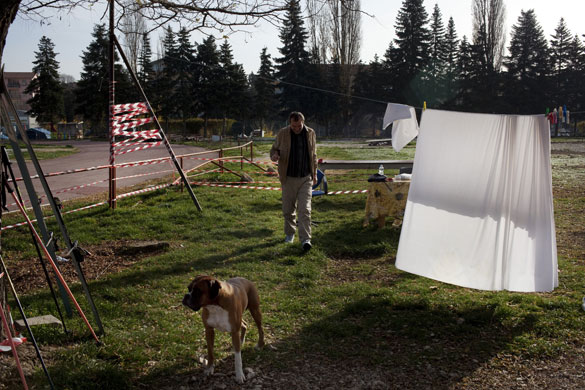 L'Aquila - 7 months later: Joseph from Romania walks among the few tents that still remain occupied