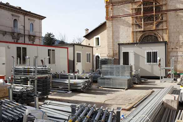 L'Aquila - 7 months later: Materials used to restore a church and adjacent buildings