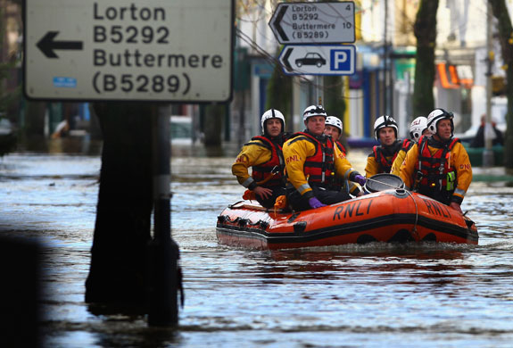Weather floods: Rescue workers continue their search on November in the town of Cockermouth