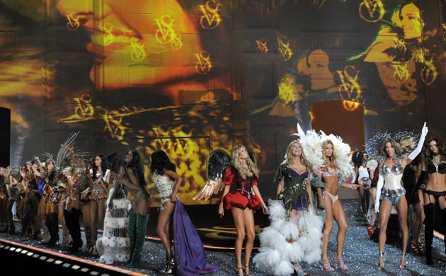 Victoria Secret models pose on the runway 