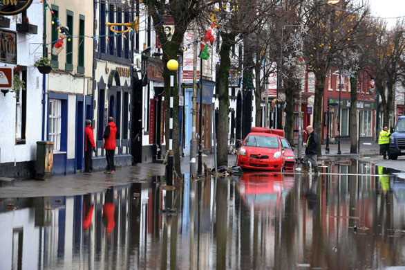 Cockermouth floods: Abandoned cars in Cockermouth High Street in Cumbria 