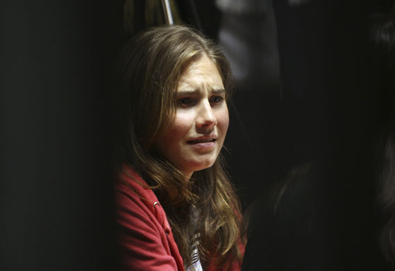 Meredith Kercher trial: Murder suspect Amanda Knox reacts during a hearing at Perugia's court