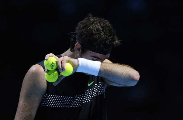 ATP World Tennis Finals: Juan Martin Del Potro wipes sweat from his face during the match