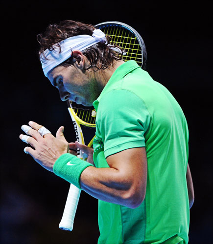 ATP World Tour Tennis: Rafael Nadal of Spain gestures as he plays against Robin Soderling