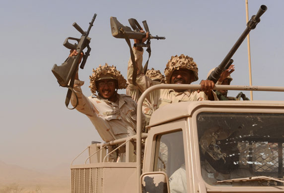 Mazrak camp in Yemen : Saudi troops cheer as they ride at the b