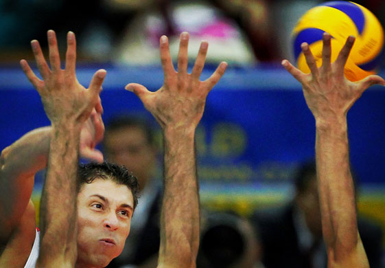 24 hours in sport: Michael Sanchez Bozlueva of Cuba spikes the ball 