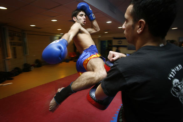 24 hours in sport: Uriel Ben-Hamo, Israel's kickboxing champion, trains in a gym
