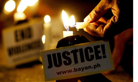 Protesters in Manila call for justice after the massacre  in the southern Philippines.