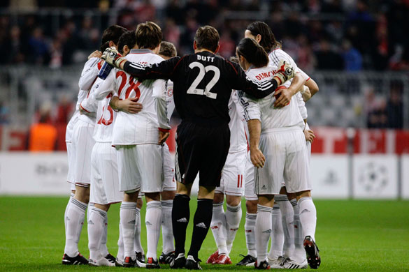 Wed champs 2: Bayern Munich players hug at the start of the match against Maccabi Haifa 