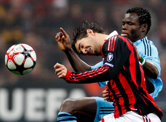 Wed champs 2: Milan forward Pato wins the ball from Marseille defender Taye Taiwo