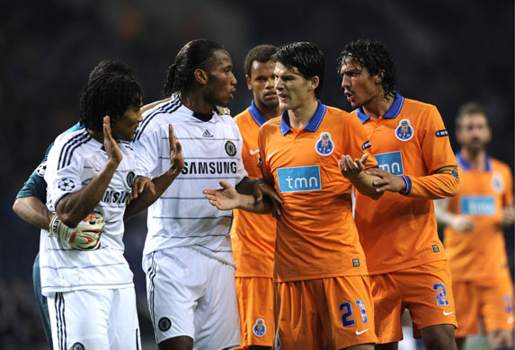 wed 3 champions: Porto's Cristian Sapunaru and Chelsea's Florent Malouda clash 