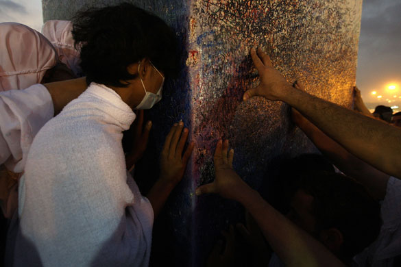 Mecca Hajj: Muslim pilgrims pray on a rocky hill called the Mountain of Mercy