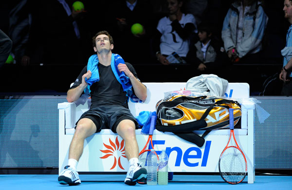 Andy Murray Day 5: An exhausted Murray sits in his chair after winning the match