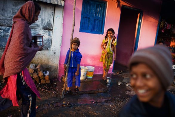24 Hours in Pictures: Children play near the Union Carbide factory  in Bhopal