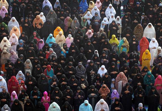 24 Hours in Pictures: Muslim women offer Eid al-Adha prayers at a school ground in Chennai