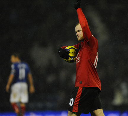 Pompey v United: Wayne Rooney walks off with the matchball
