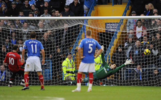 Pompey v United: Wayne Rooney scores United's first from the penalty spot