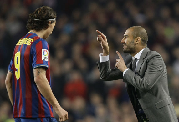Barcelona v Real Madrid: Barcelona's Ibrahimovic listens to coach Guardiola