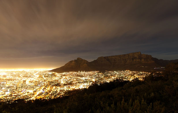 24 hours: Cape Town lights up as dusk falls over the city's backdrop Table Mountain