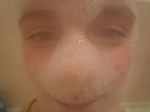 Kingsmead School: Paula's self-portrait with her face covered with bubbles