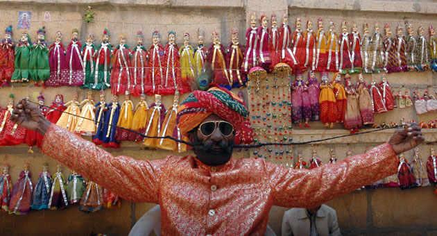 30 November 2009: Rajasthan, India: Dhanna Ram displays his 4.5 feet-long moustache