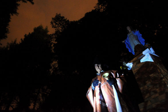 24 hours: rings a bell near cemetery to wake the souls of the dead in Colombia