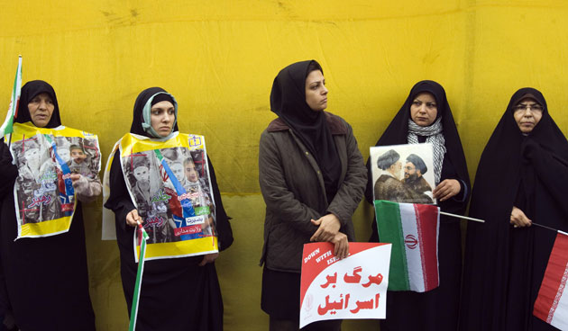 Iran protests: Iranian women attend a rally outside the former US embassy in Tehran