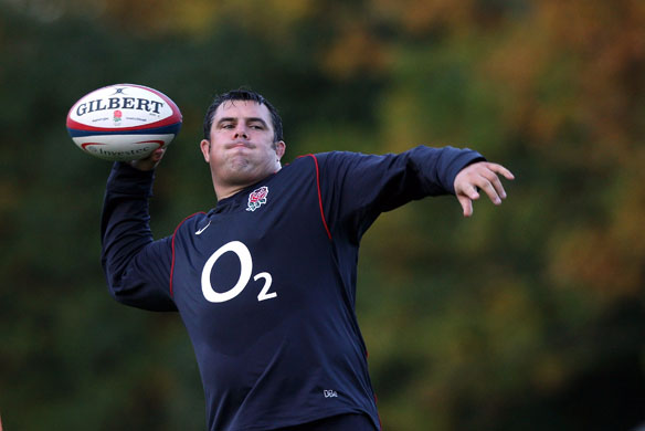 England Rugby Team: Duncan Bell throws the ball during an England training session