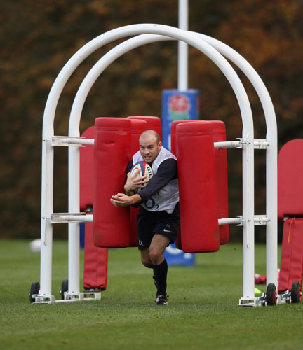 England Rugby Team: Paul Hodgson runs with a ball during an England training Session