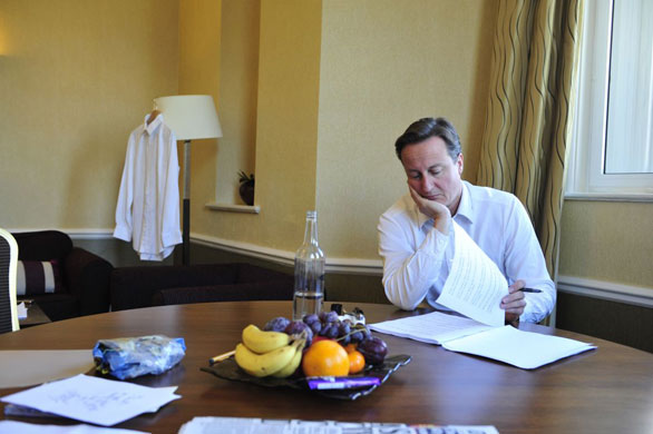 Andrew Parsons Propaganda: David Cameron Going through his speech in his hotel room