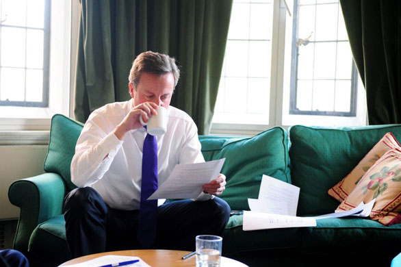 Andrew Parsons Propaganda: David Cameron goes through his speech on Europe in his office