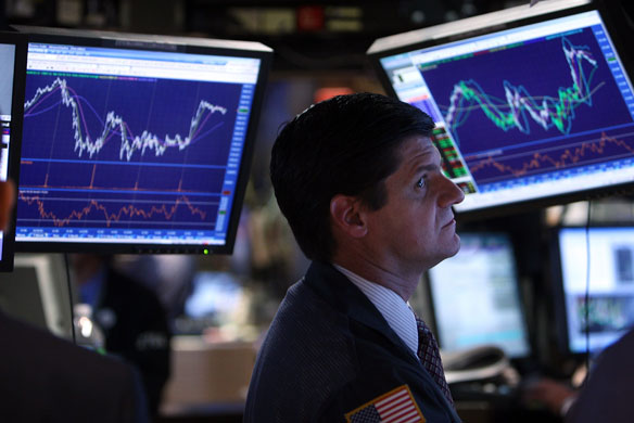 Week in Business: Traders work on the floor of the New York Stock Exchange