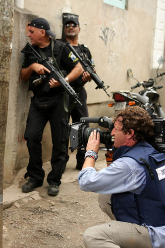 Slums in Rio De Janeiro: Director Of Photography Lance Gewer films police raid in Complexo do Alemao