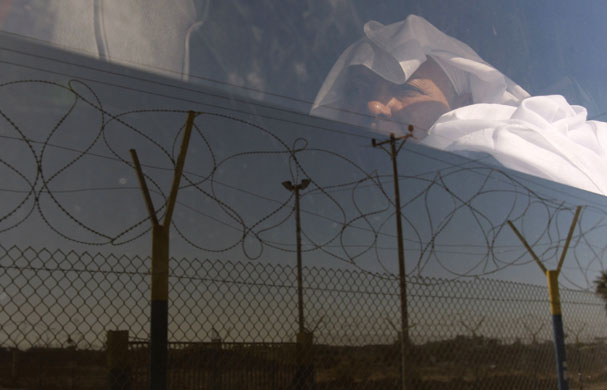 24 hours: Palestinian woman sits in a bus
