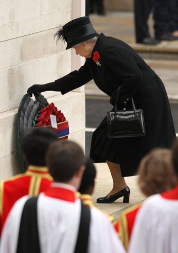 Remembrance Sunday: Queen Elizabeth II lays a wreath at the Cenotaph, on Whitehall