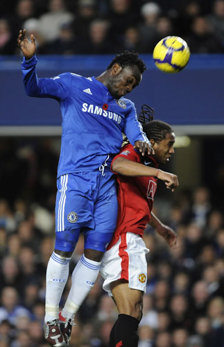 Chelsea v Man Utd: Michael Essien heads the ball above Anderson