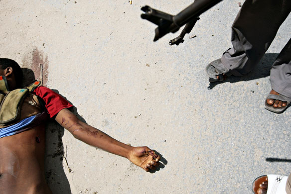 24 hours in pictures: SOMALIA-VIOLENCE-DEAD-FIGHTER