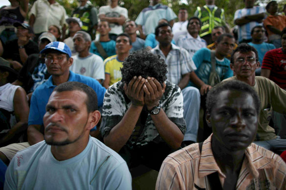 24 hours in pictures: gold miners meet officials in colombia