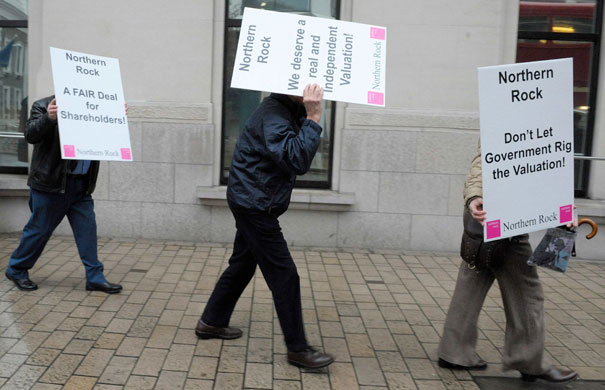 Week in Business: Representatives of smaller shareholders in Northern Rock carry placards