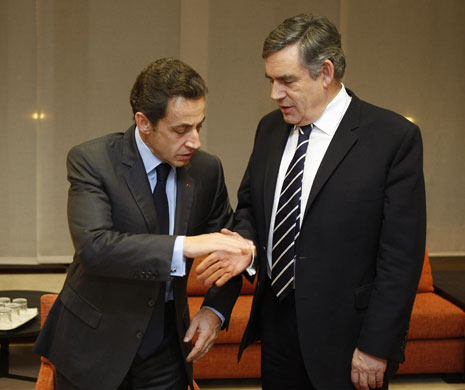 Week in Business: Nicolas Sarkozy and British Prime Minister Gordon Brown greet each other 
