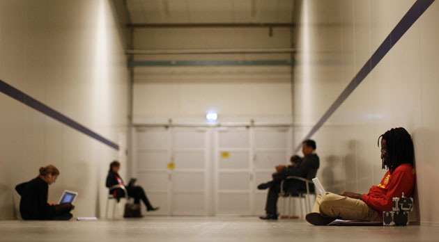 Copenhagen diary: COP 15 People work with their laptops during at Bella centre